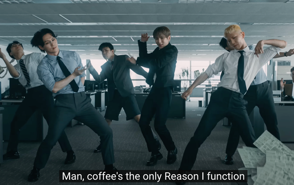 Key and backup dancers in an office as he sings, "Man, coffee's the only Reason I function"